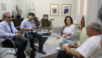 Reunião de Firmino e Iracema com representantes da Fazenda da Paz