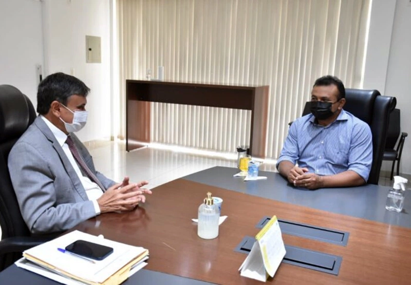 Wellington Dias e Fábio Abreu em reunião.